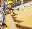 rsz graphicstock latin american construction worker on house roof with measuring tape copy space sqwn w dw