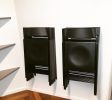 hanging folding chairs on wall with hook