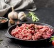 high angle meat plate with herbs garlic scaled