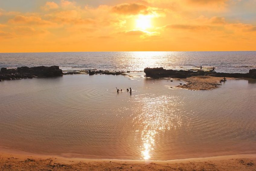 lagoon at sunset time in the National Park Achziv Israel